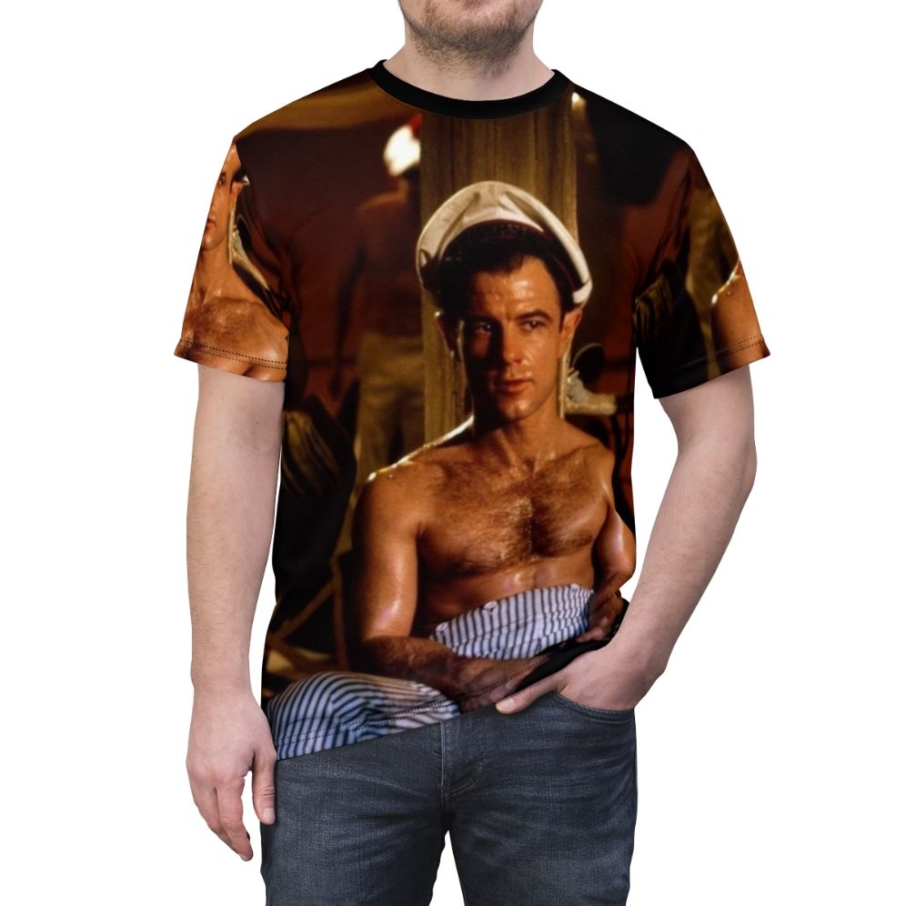 Vintage-style t-shirt featuring Brad Davis from the film Querelle, with a shirtless, hairy-chested, sexy sailor design. - men front