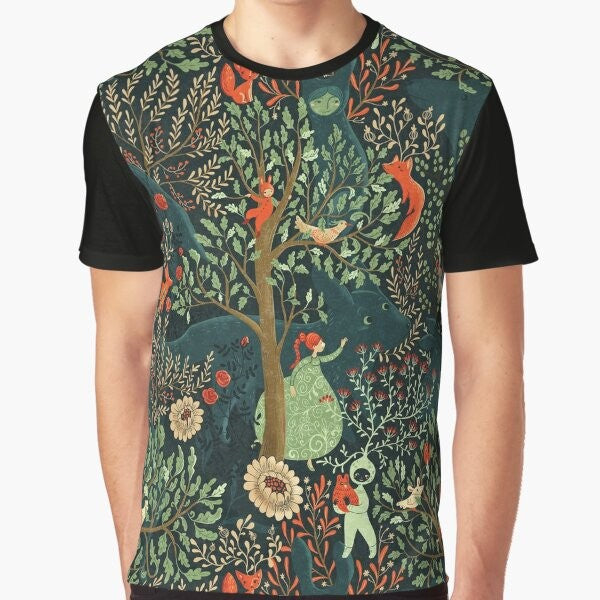 Whimsical and enchanting graphic t-shirt featuring a forest-inspired pattern with fairytale elements like a fox, trees, and floral designs in shades of green.