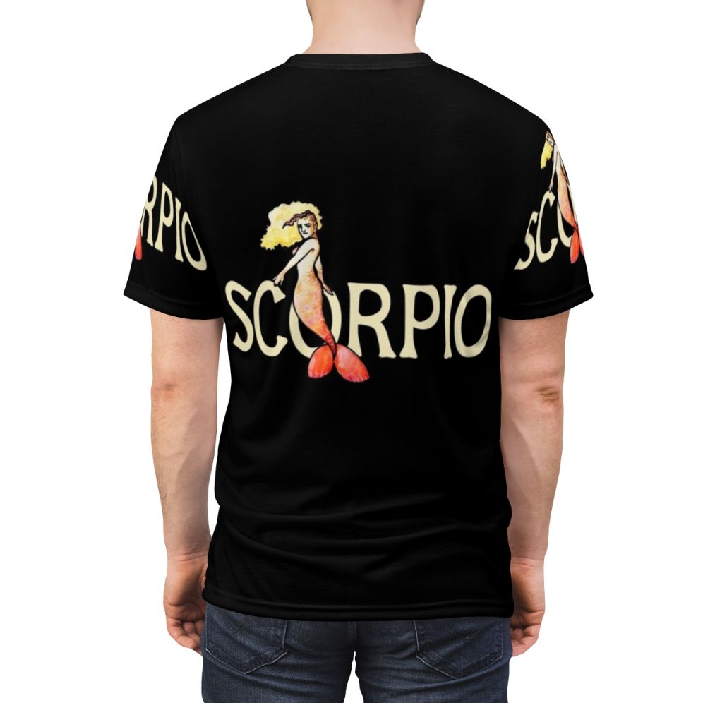 A stylish t-shirt featuring a graphic design of a scorpio mermaid, a mythical sea creature representing the zodiac sign. - men back