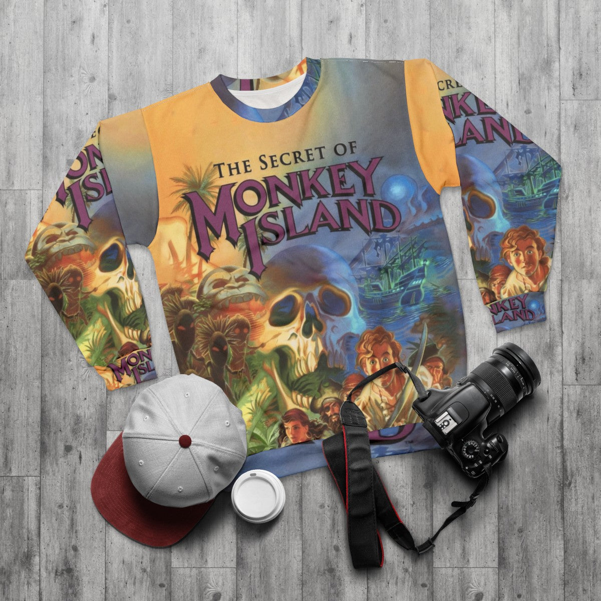 Retro Monkey Island Sweatshirt featuring Guybrush Threepwood and the iconic Three-Headed Monkey - flat lay