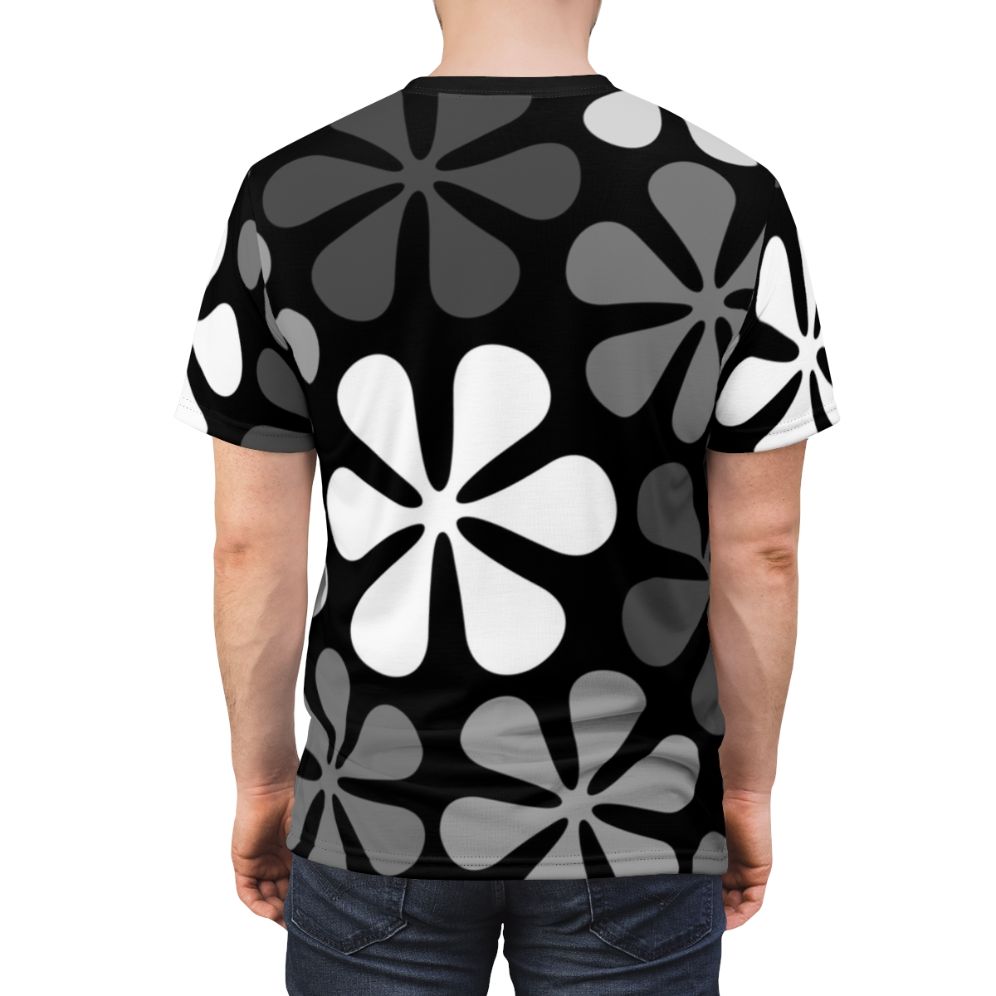 Model wearing a black and white abstract floral design t-shirt - men back