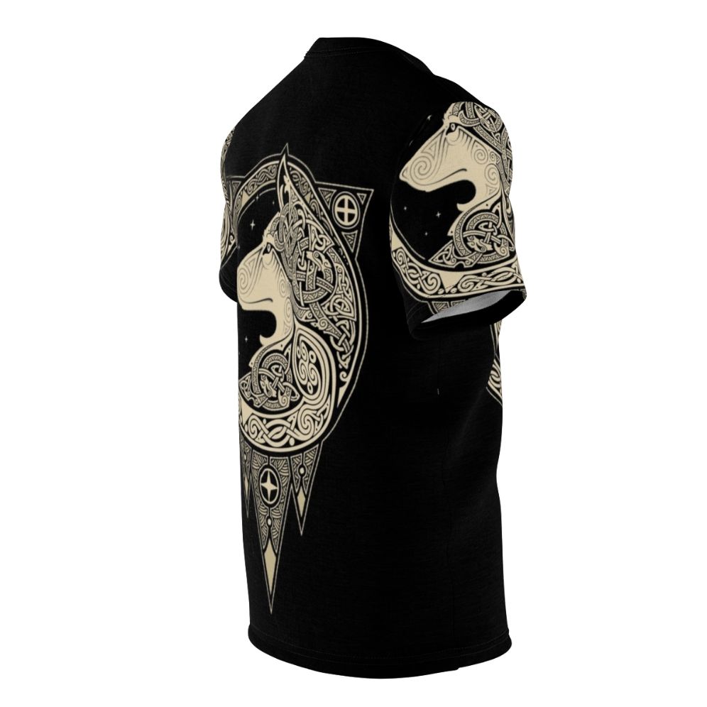 Photograph of a Norse-inspired t-shirt with a detailed wolf graphic, set against a background of celestial symbols and organic patterns. - men right