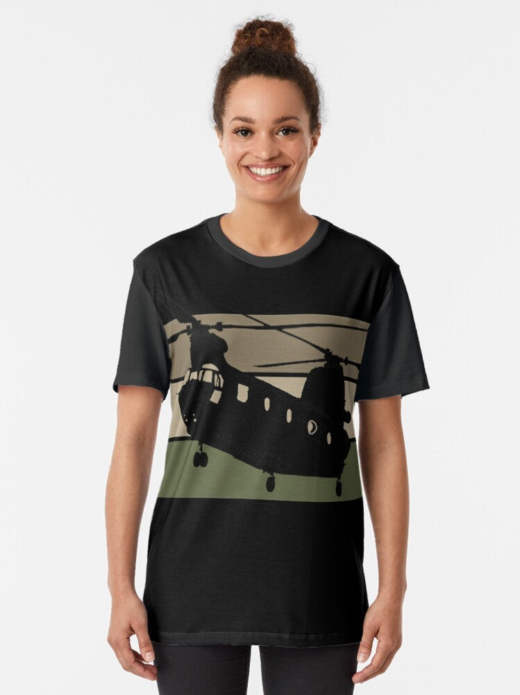 A black t-shirt featuring a graphic design of the Chinook CH-47 military helicopter - Women