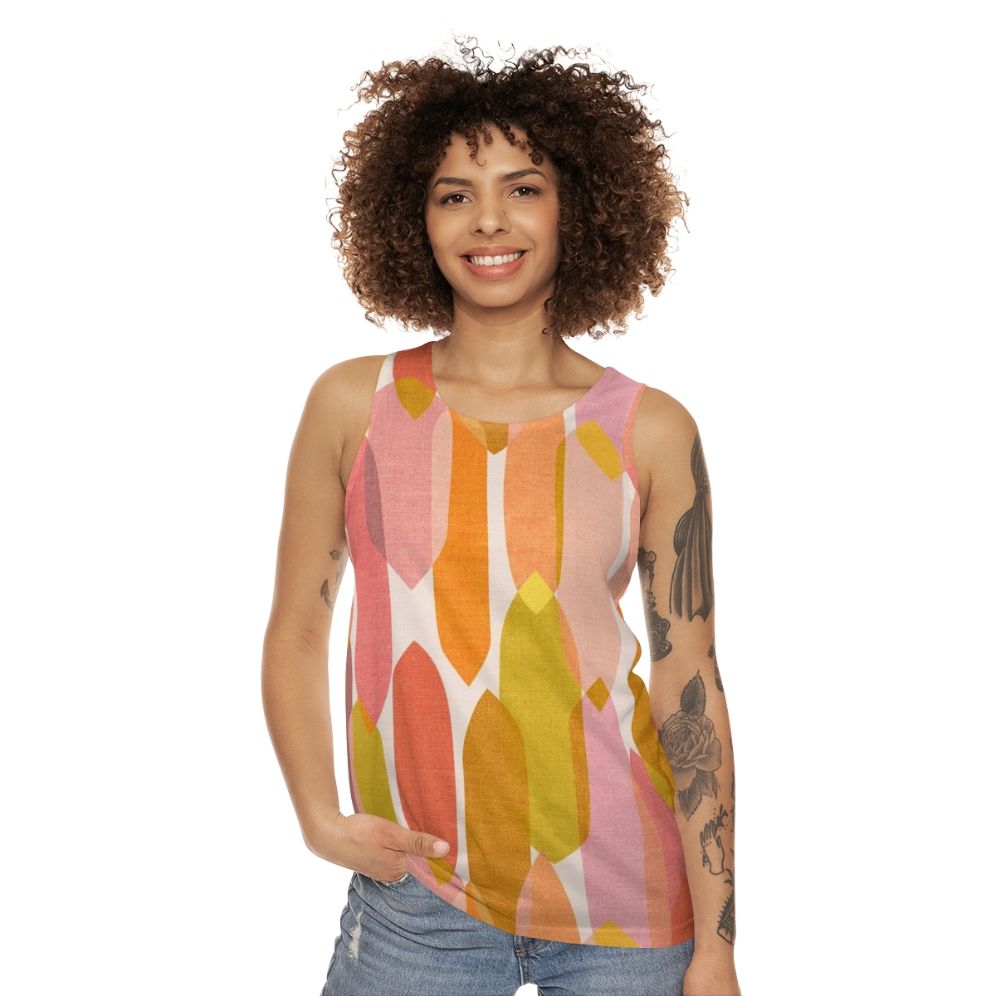 Vibrant mid-century inspired unisex tank top with abstract droplet pattern - women