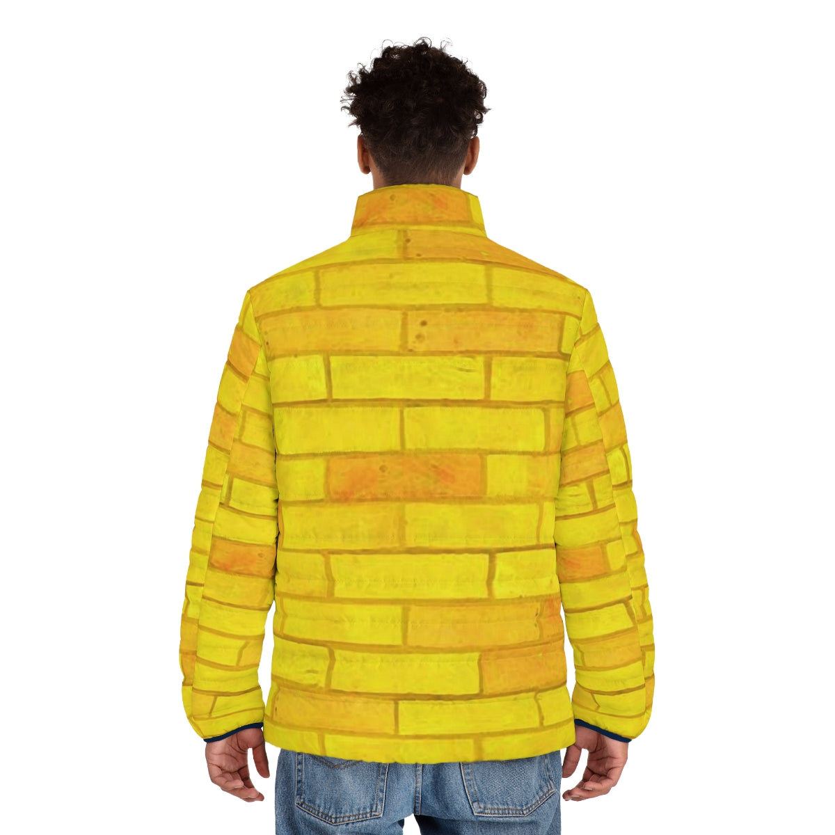 Person wearing a yellow puffer jacket with a brick road design, inspired by the Wizard of Oz - men back