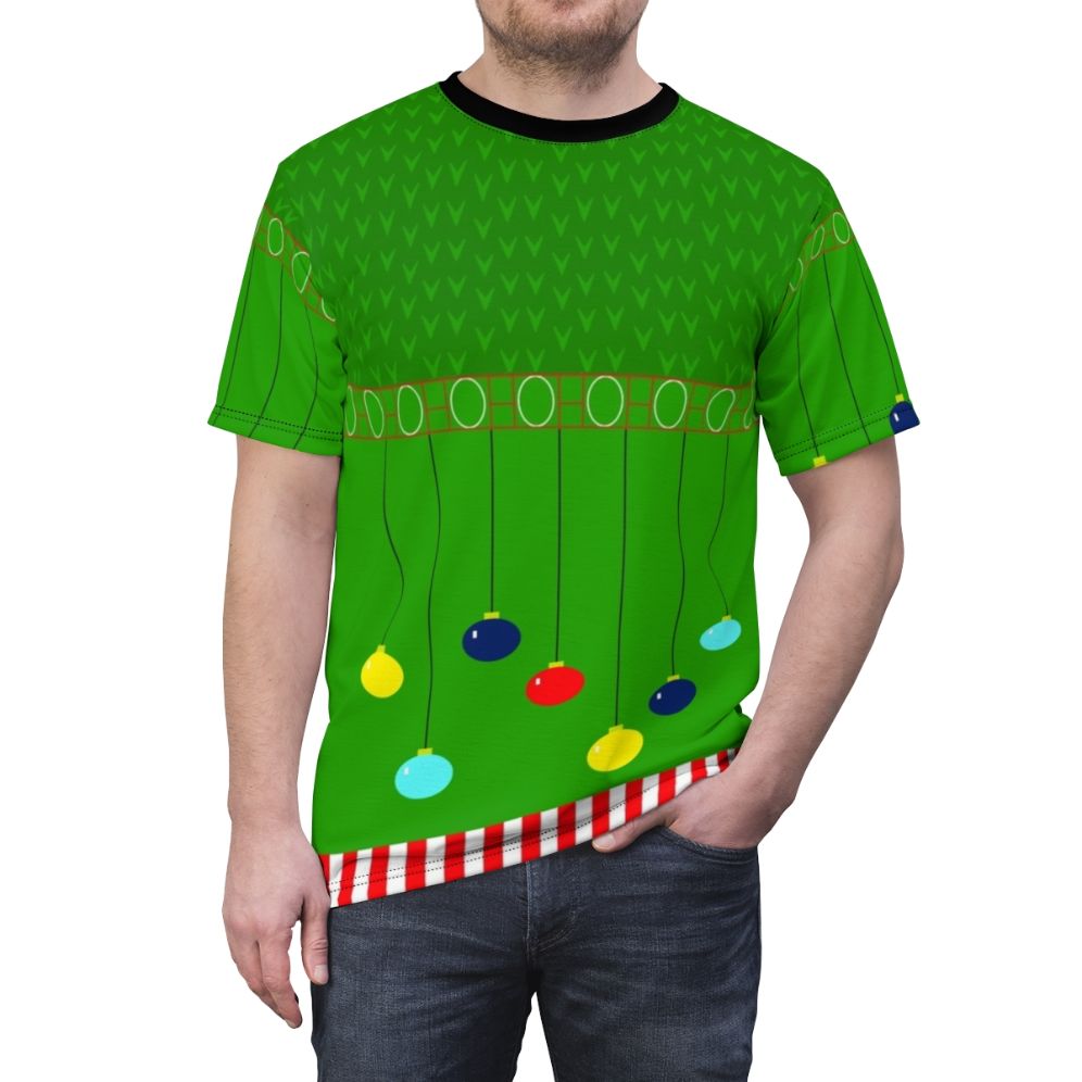 Image of a green and red t-shirt with a bold, festive Arthur Christmas sweater design - men front