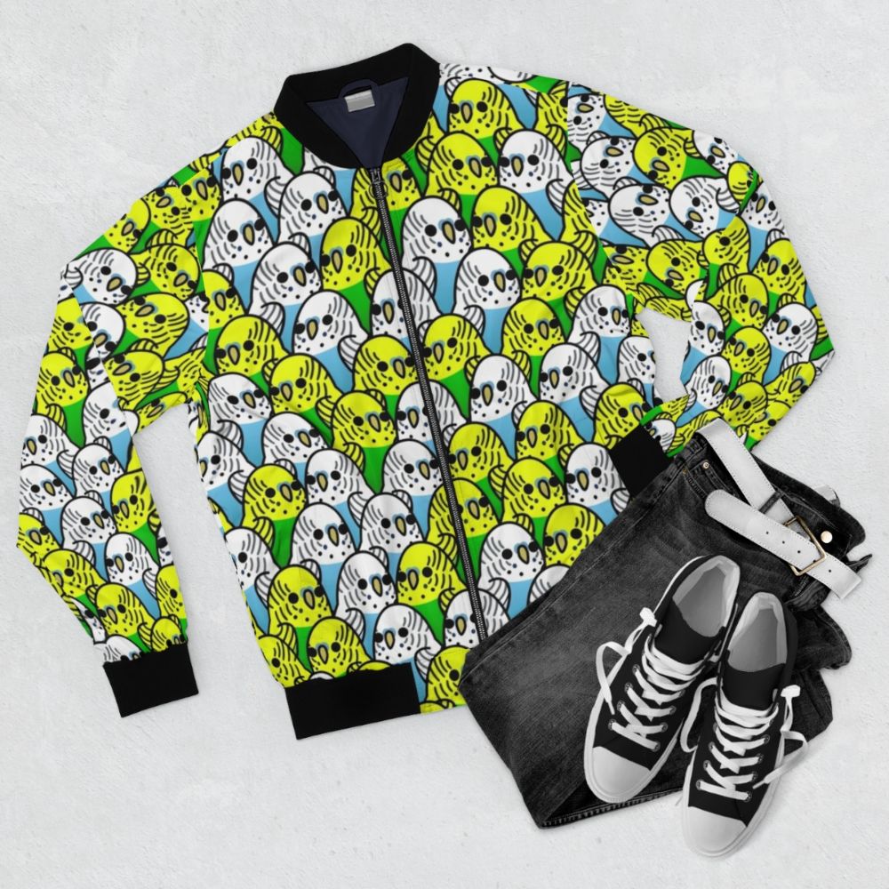 Colorful bird-themed bomber jacket with the text "Too Many Birds! Budgie Squad 1" - Flat lay