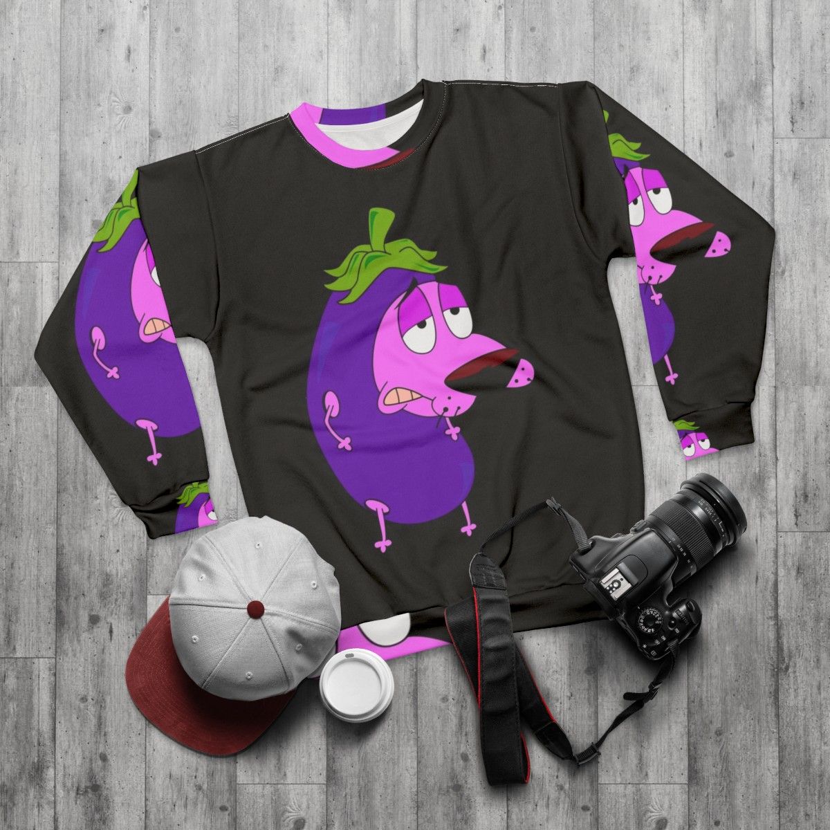 Courage The Cowardly Dog Sweatshirt featuring the iconic pink anthropomorphic dog character - flat lay