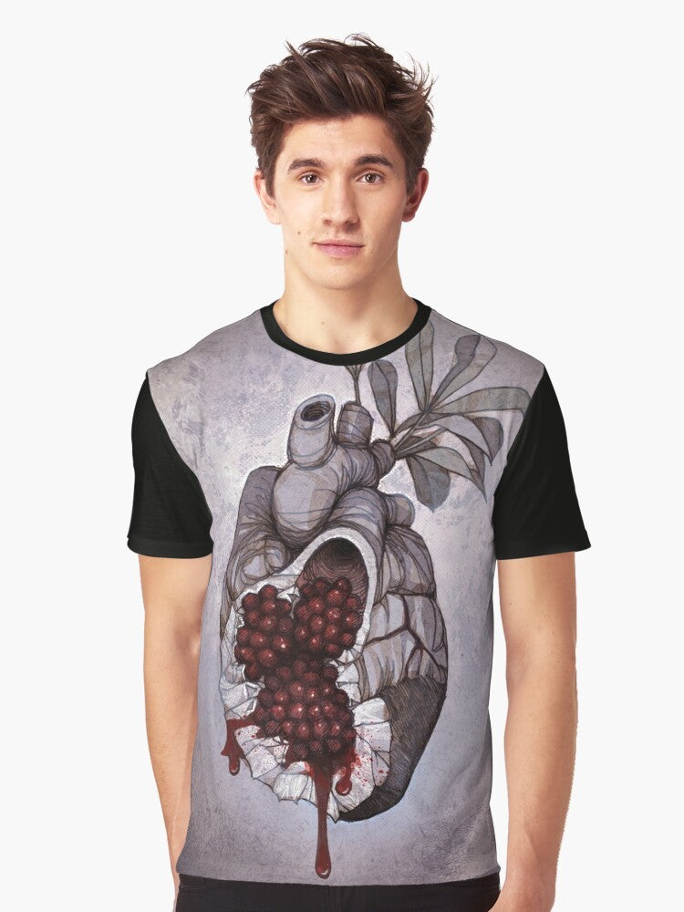 Graphic t-shirt featuring an anatomical illustration of a human heart with pomegranate seeds, inspired by the Greek mythology of Persephone. - Men