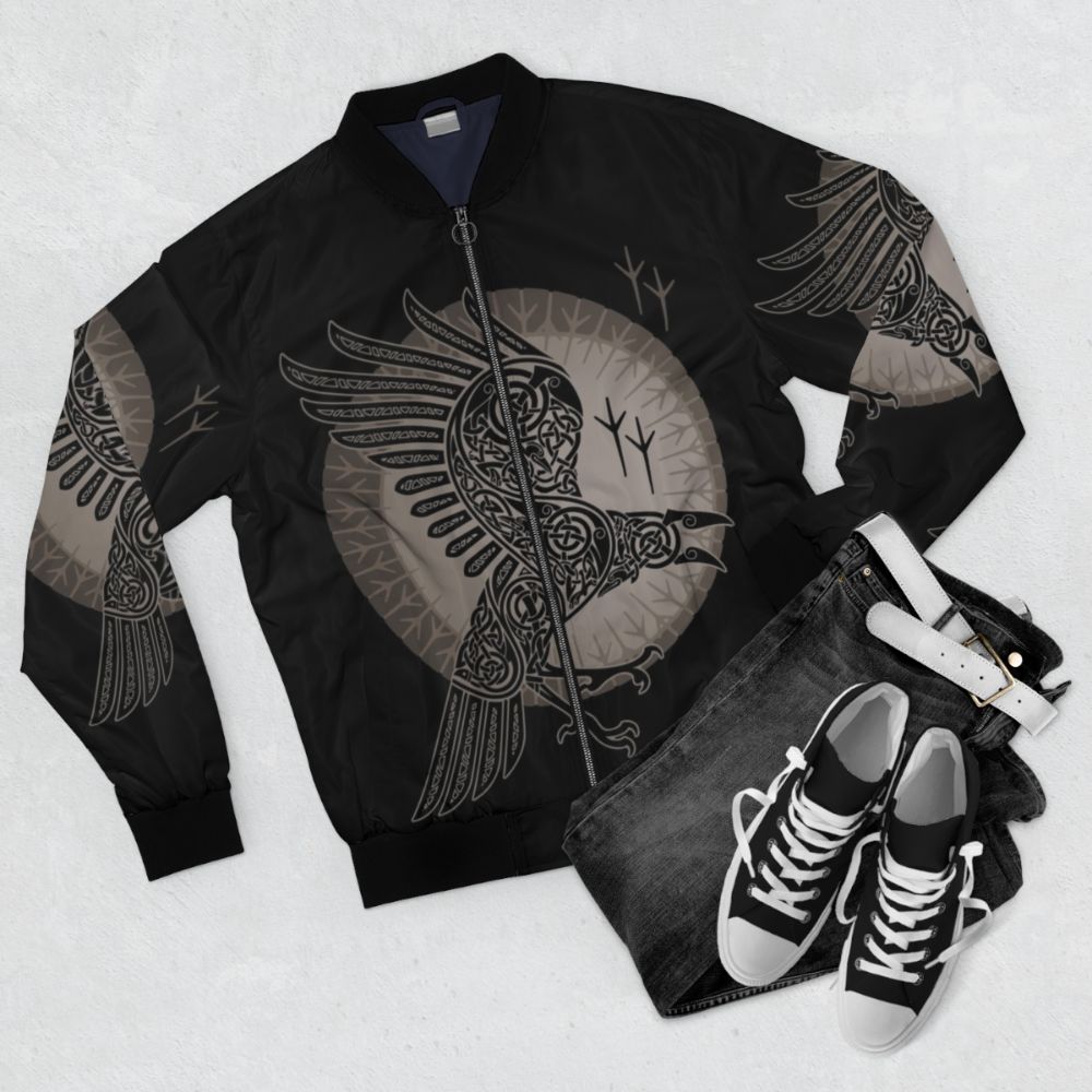 Raven Scandinavian Tribal Bomber Jacket with Tribal Patterns and Mythical Creature Design - Flat lay