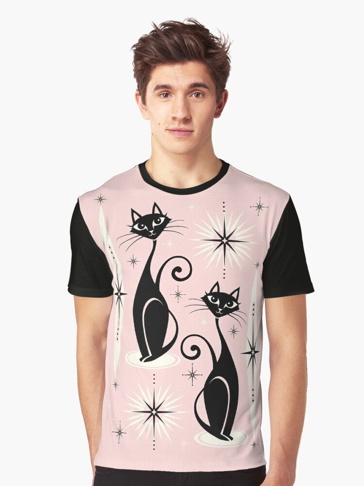 Mid century modern graphic t-shirt featuring atomic-inspired cats and starbursts in a warm pink design - Men