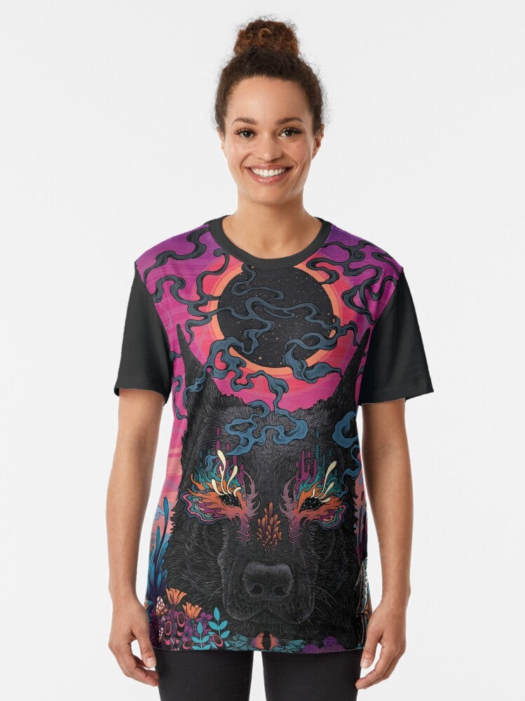 A graphic t-shirt featuring a psychedelic, surreal design of a dog in nature with neon colors and floral elements. - Women