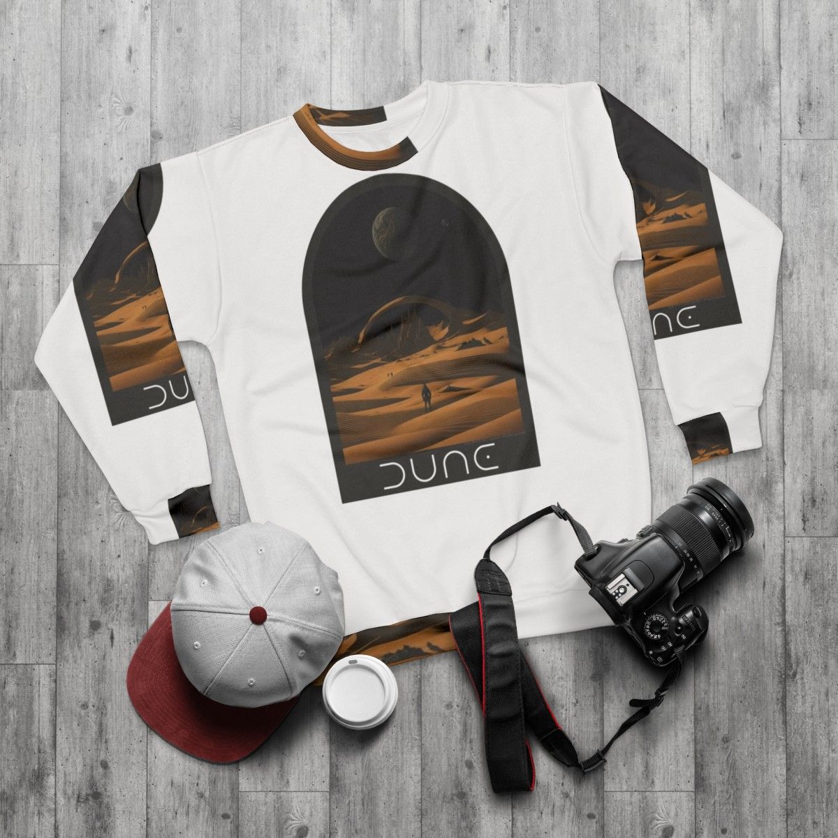 Dune-inspired sweatshirt with desert landscape design - flat lay