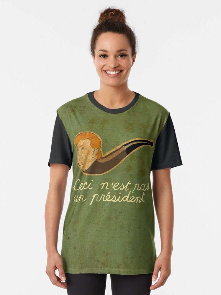 Surreal graphic t-shirt featuring the text "CECI N'EST PAS UN PRESIDENT" inspired by the works of René Magritte's surrealist art. - Women