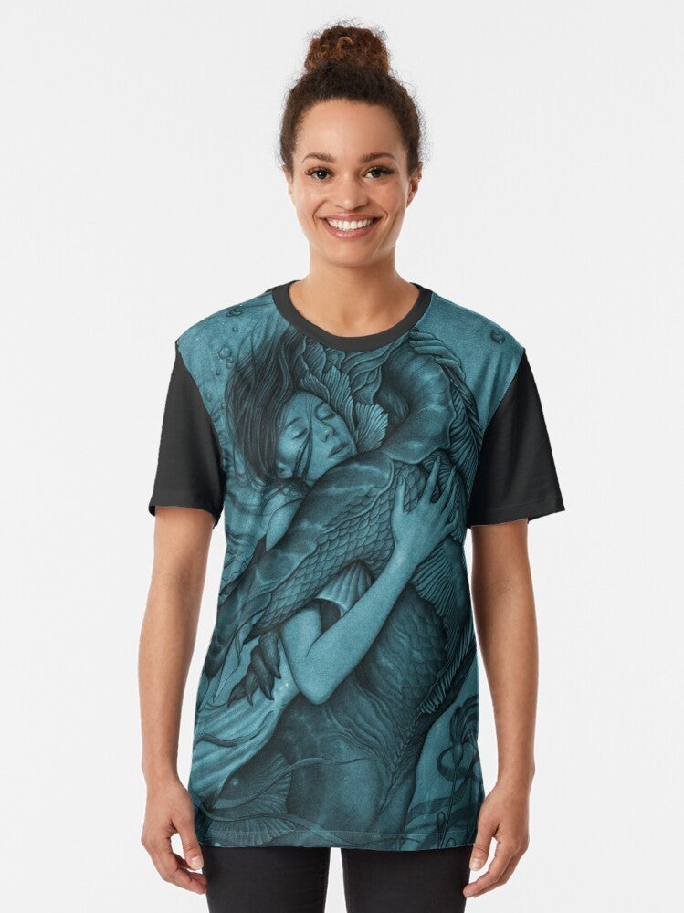 The Shape of Water movie-inspired graphic t-shirt featuring a fantasy fish-man and a woman in a laboratory setting. - Women