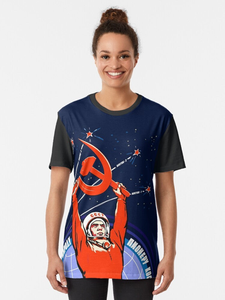 Vintage Soviet propaganda-style graphic featuring cosmonaut Yuri Gagarin and a spaceship - Women