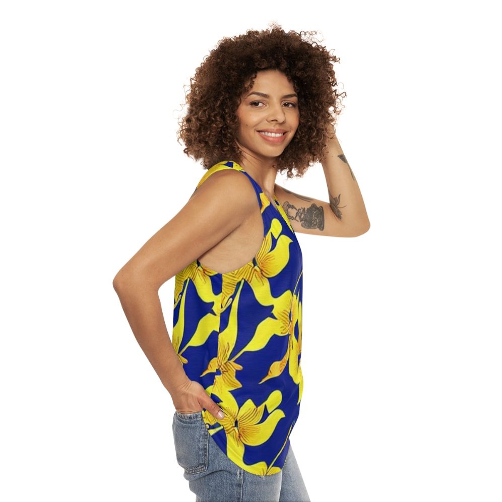 Abstract yellow floral pattern on blue unisex tank top - women side