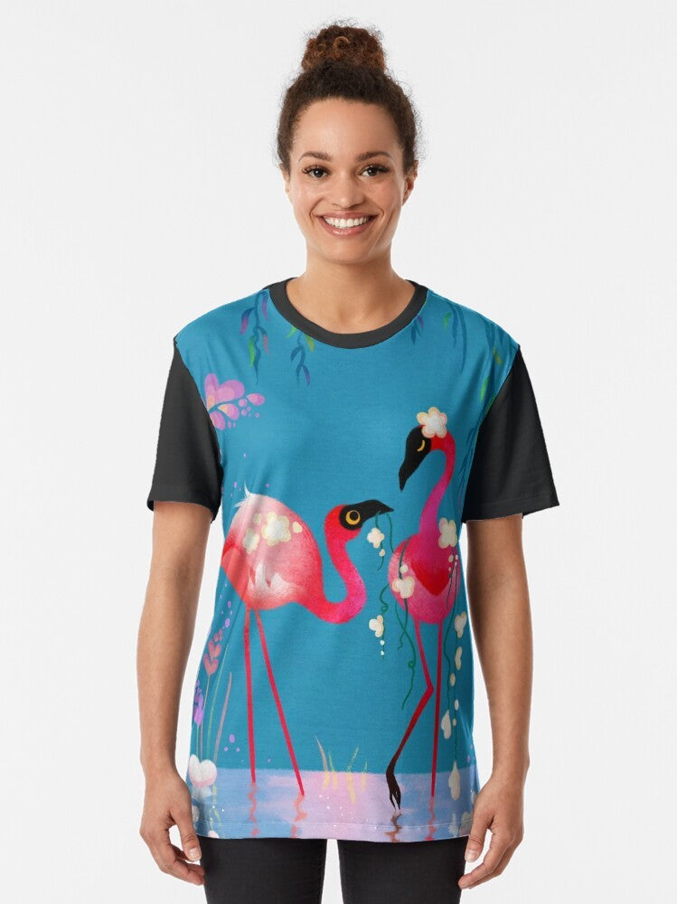 Colorful graphic design of a flamingo bird surrounded by vibrant flowers and foliage on a t-shirt. - Women