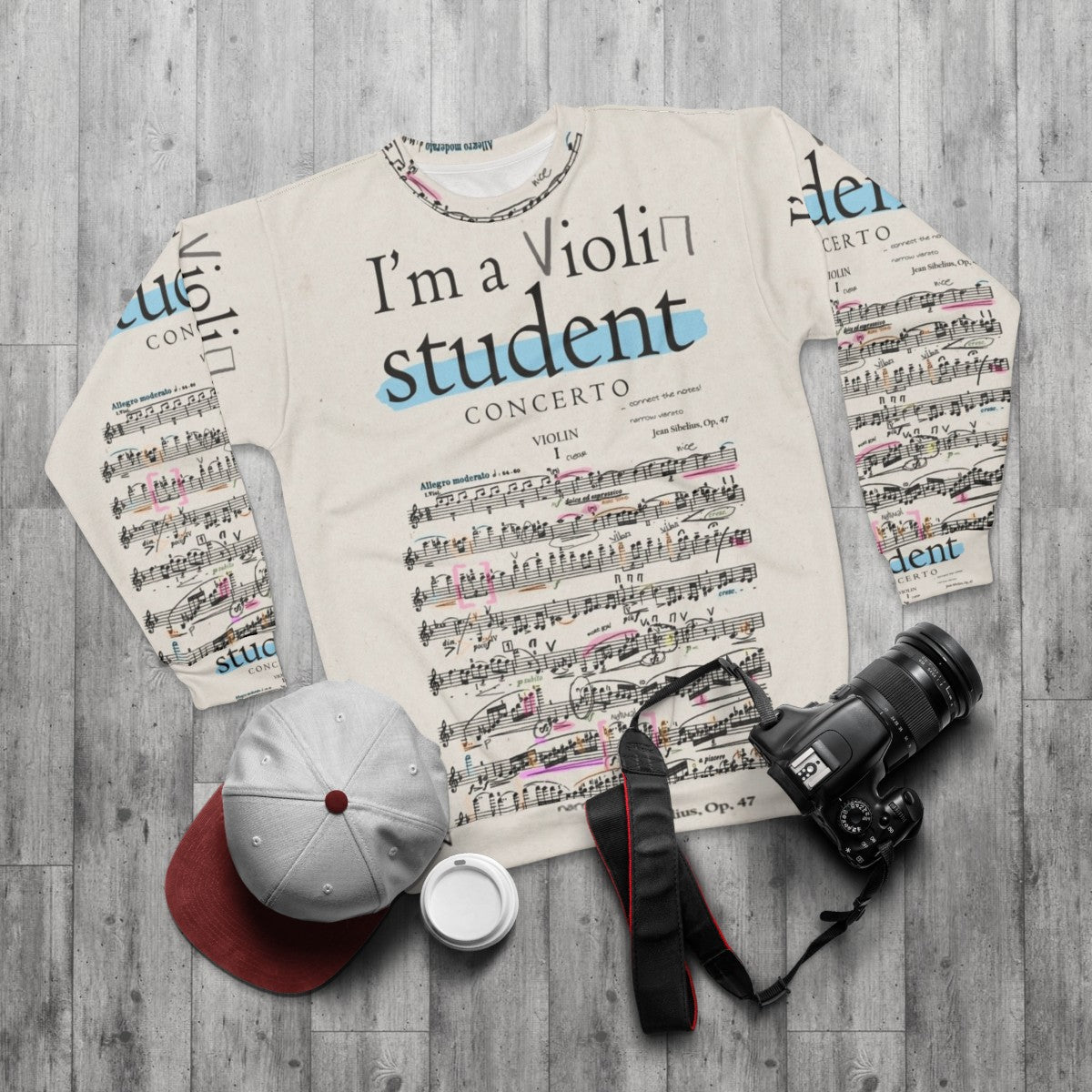 Violin student sweatshirt with classical music notes and design - flat lay