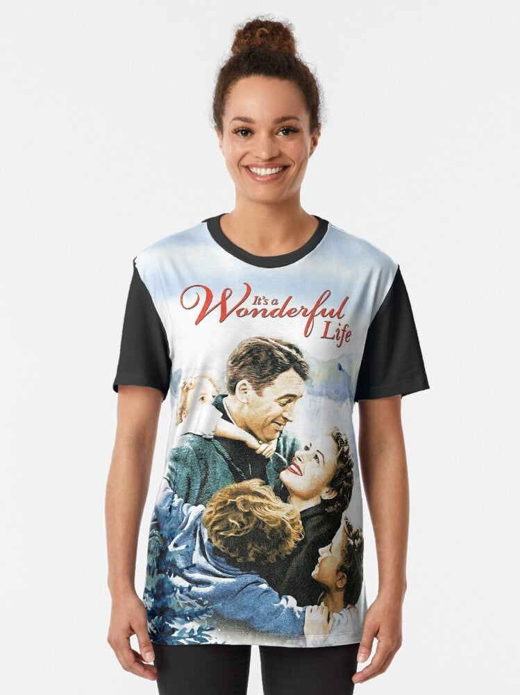 "It's a Wonderful Life" movie scene graphic t-shirt featuring a winter landscape and the classic tagline "It's a Wonderful Life" - Women