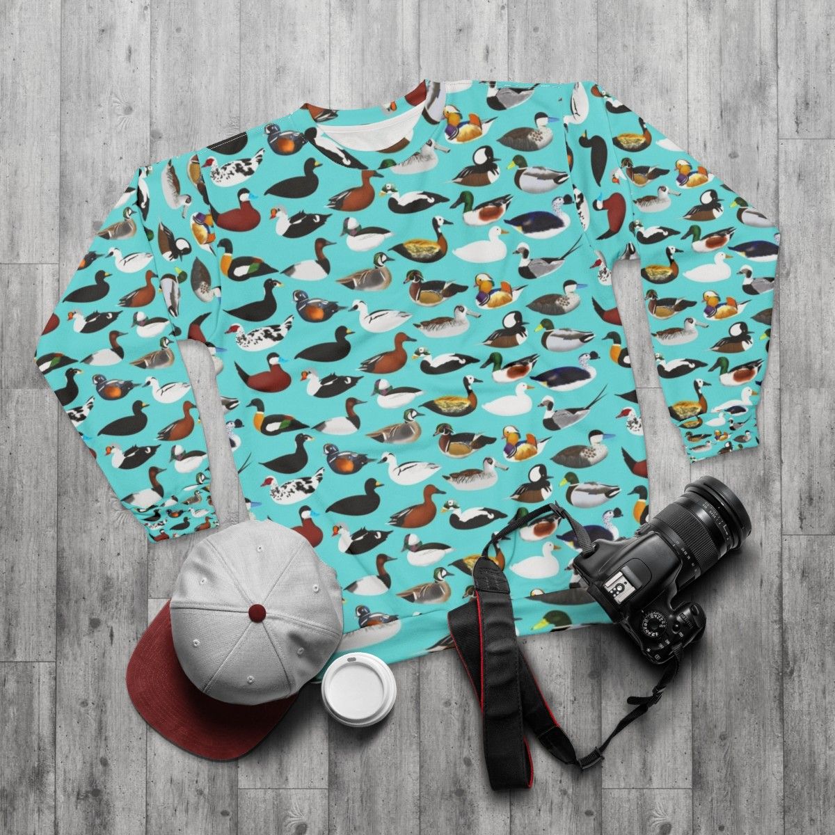 Stylish duck sweatshirt for nature and wildlife enthusiasts - flat lay