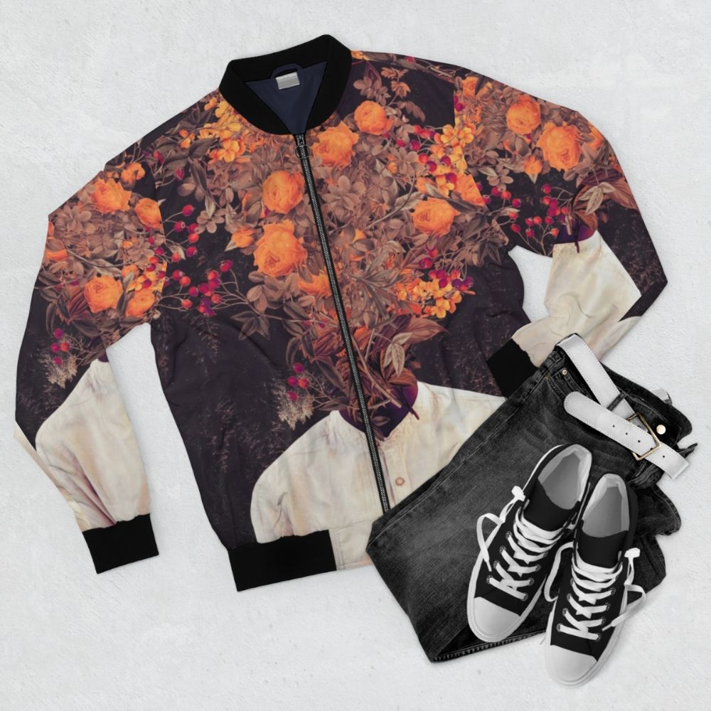 Vintage-inspired floral bomber jacket with a surreal, collage-style design. - Flat lay