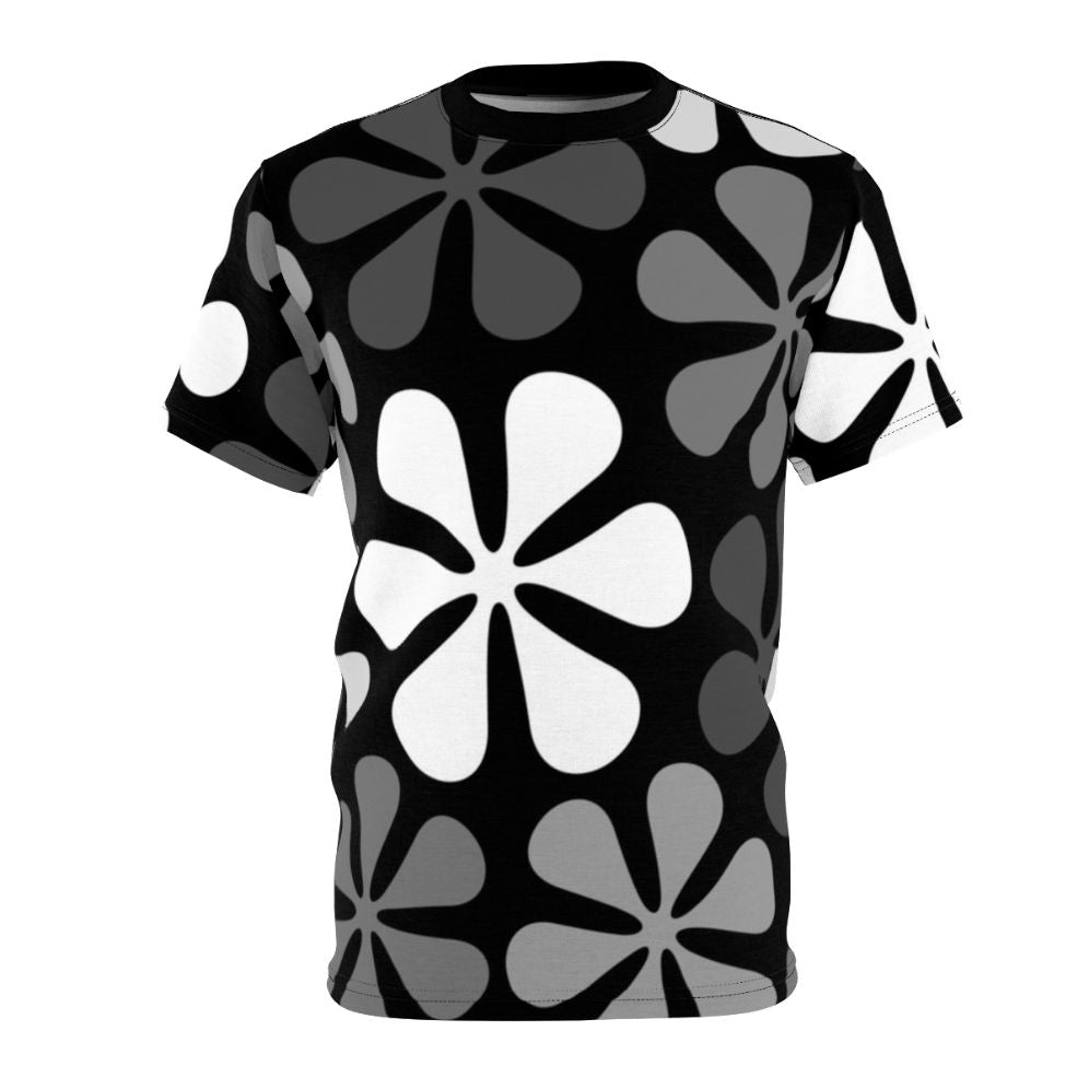 Model wearing a black and white abstract floral design t-shirt