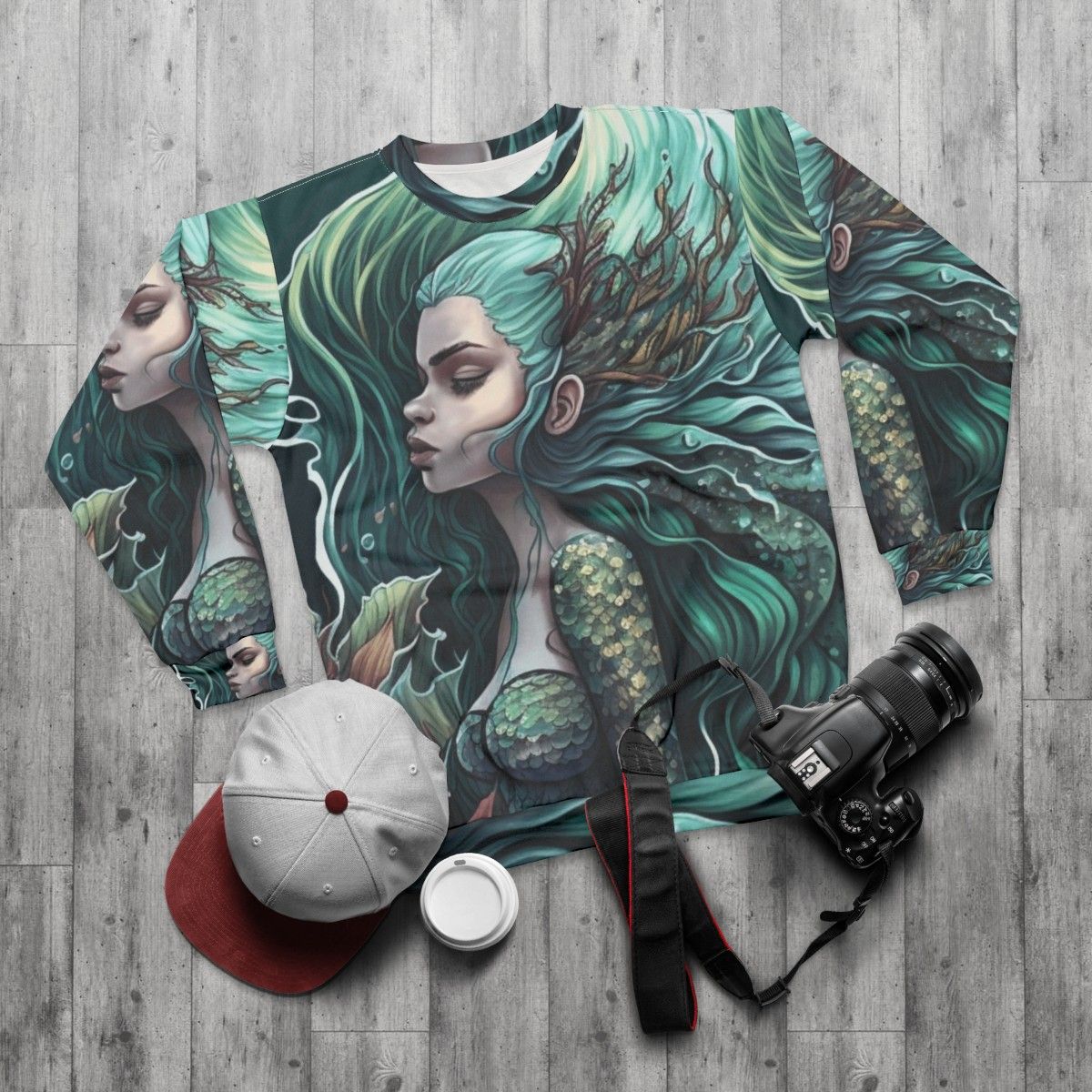 Sweatshirt featuring enchanting mythical sea creatures - flat lay