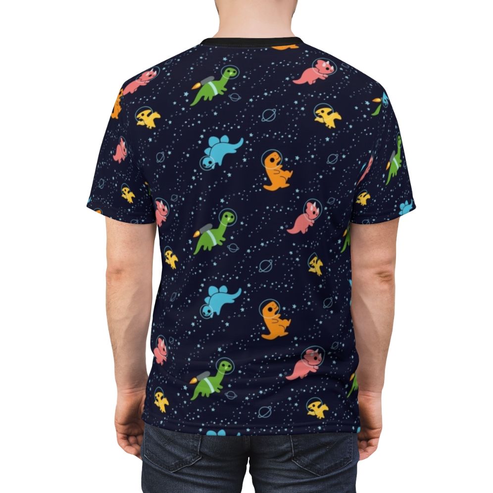 Illustrated design of a cute brontosaurus dinosaur wearing an astronaut suit and jetpack, floating in a night sky filled with stars, galaxies, and planets. - men back