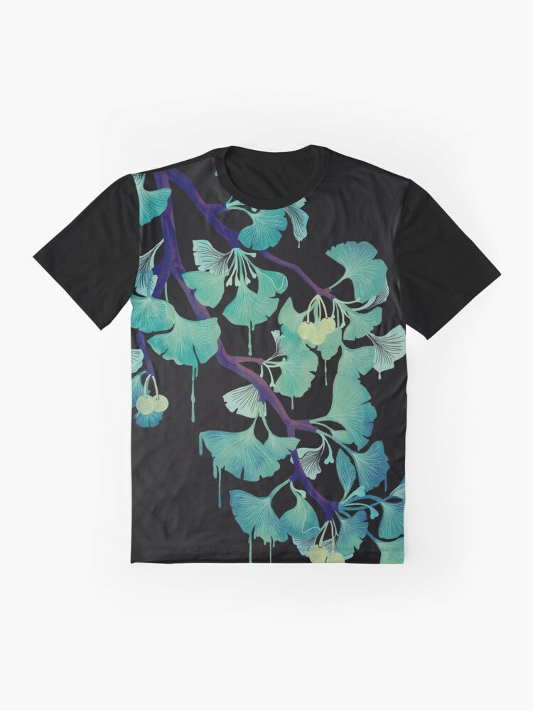 A watercolor-style graphic of a ginkgo tree on a black t-shirt. - Flat lay