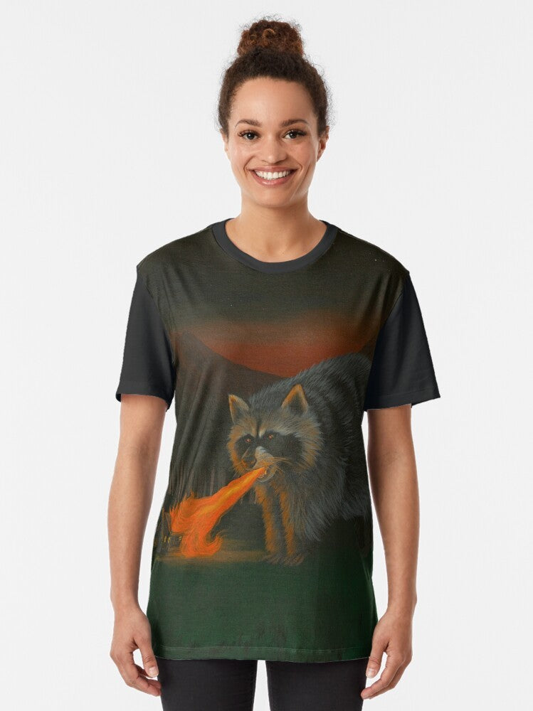 A graphic t-shirt featuring a fire-breathing raccoon illustration - Women