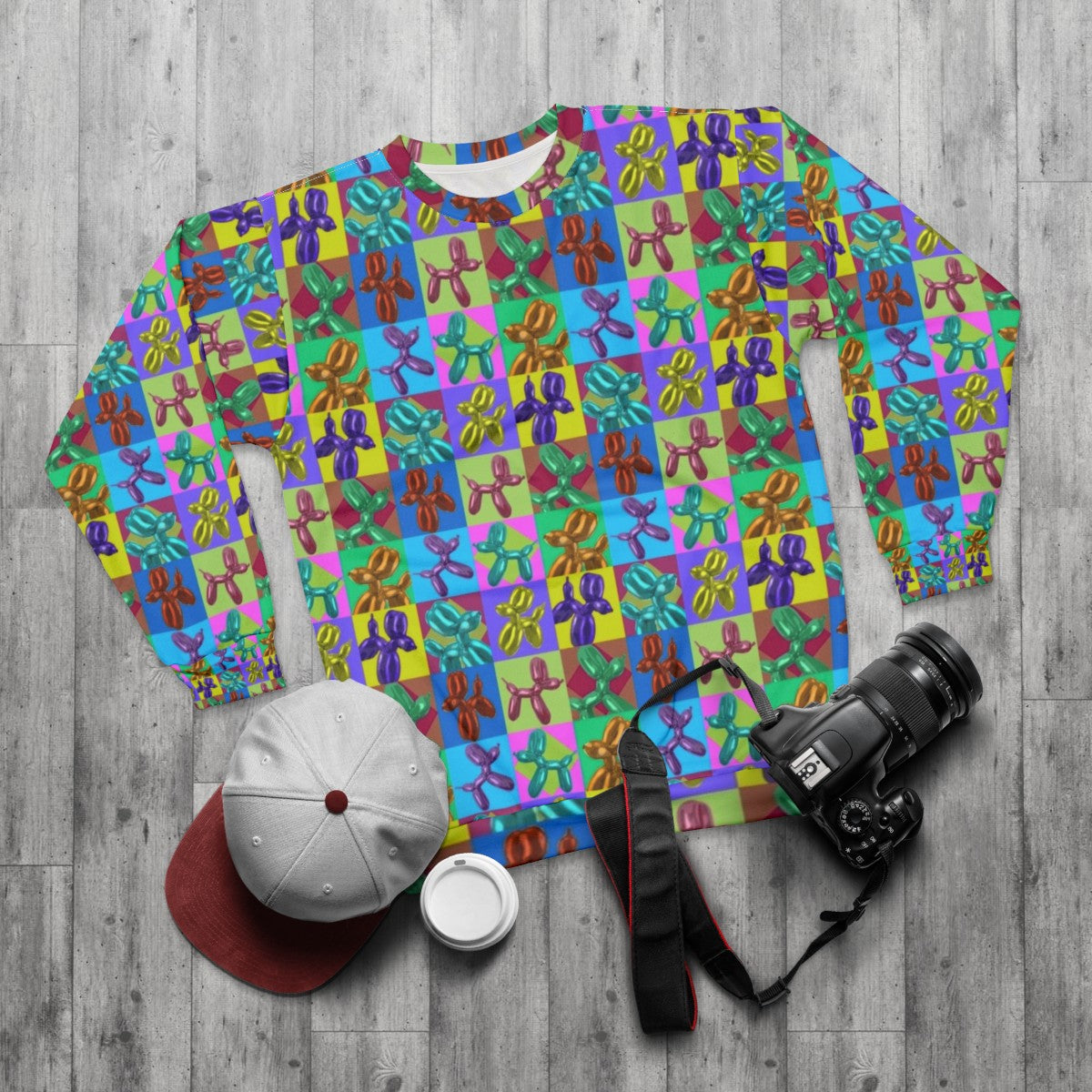 Colorful pop art balloon dogs sweatshirt - flat lay