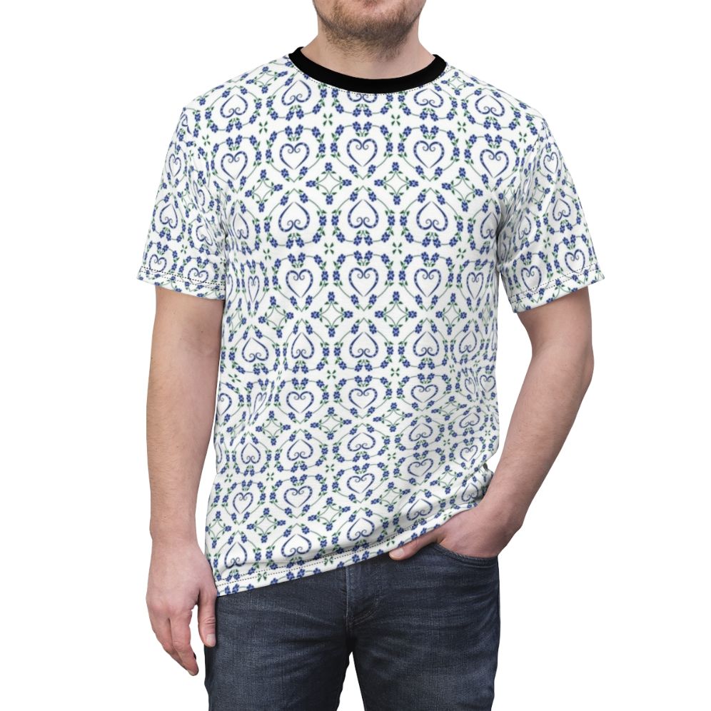 T-shirt with a blue and white pawprint, heart, and flower pattern design for dog moms, dads, and lovers. - men front