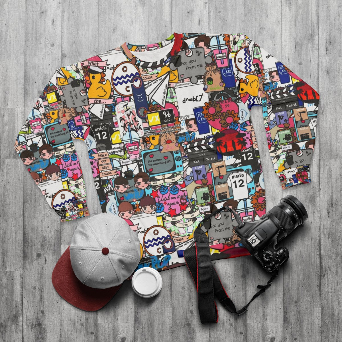 BL-themed sweatshirt with sticker bomb graphic - flat lay