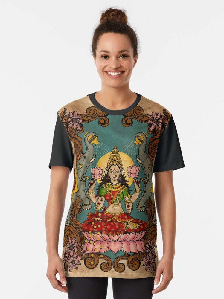 "Lakshmi, the Hindu Goddess of Wealth, portrayed on a graphic t-shirt design" - Women