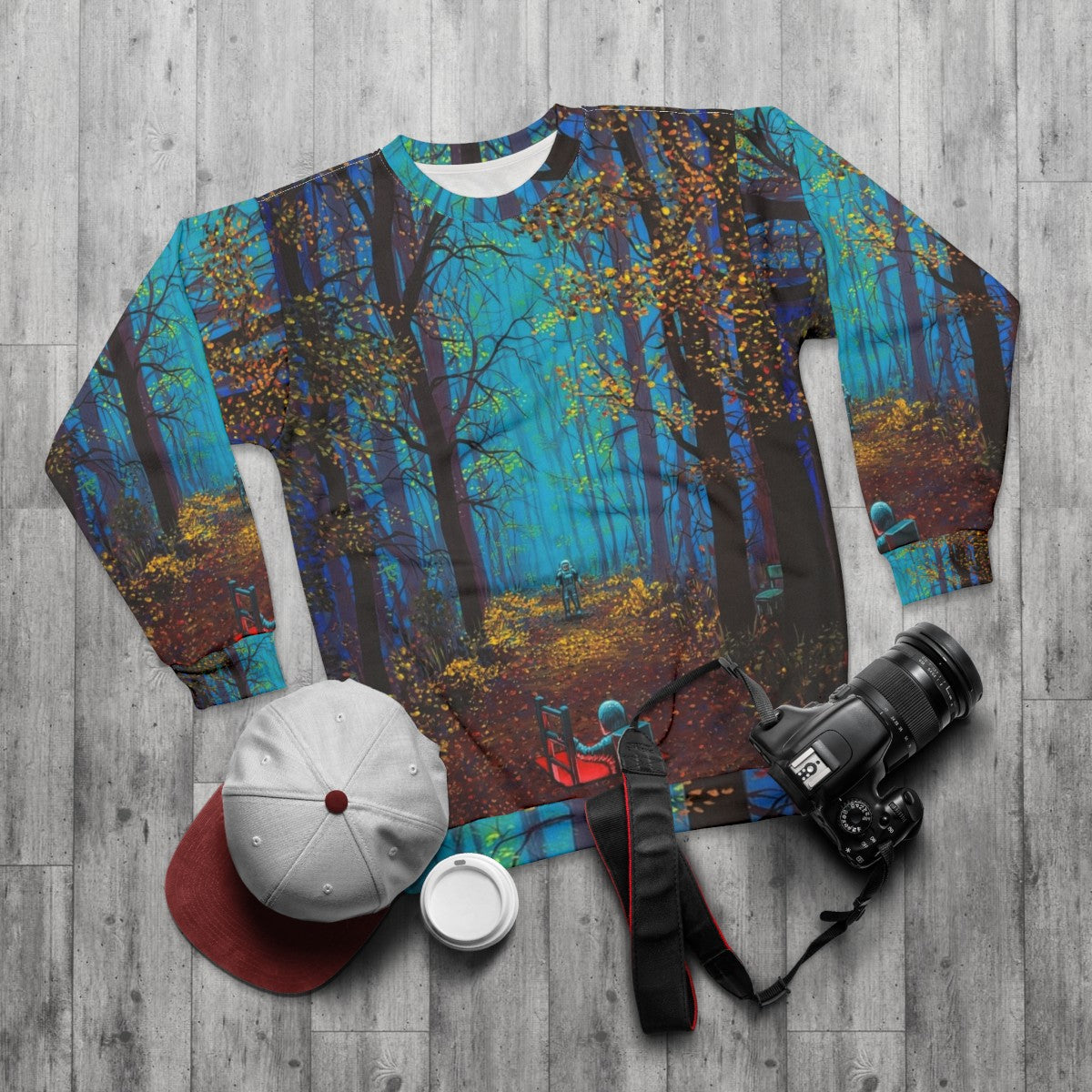 "There You Are" space-themed sweatshirt with astronaut and surreal nature imagery - flat lay