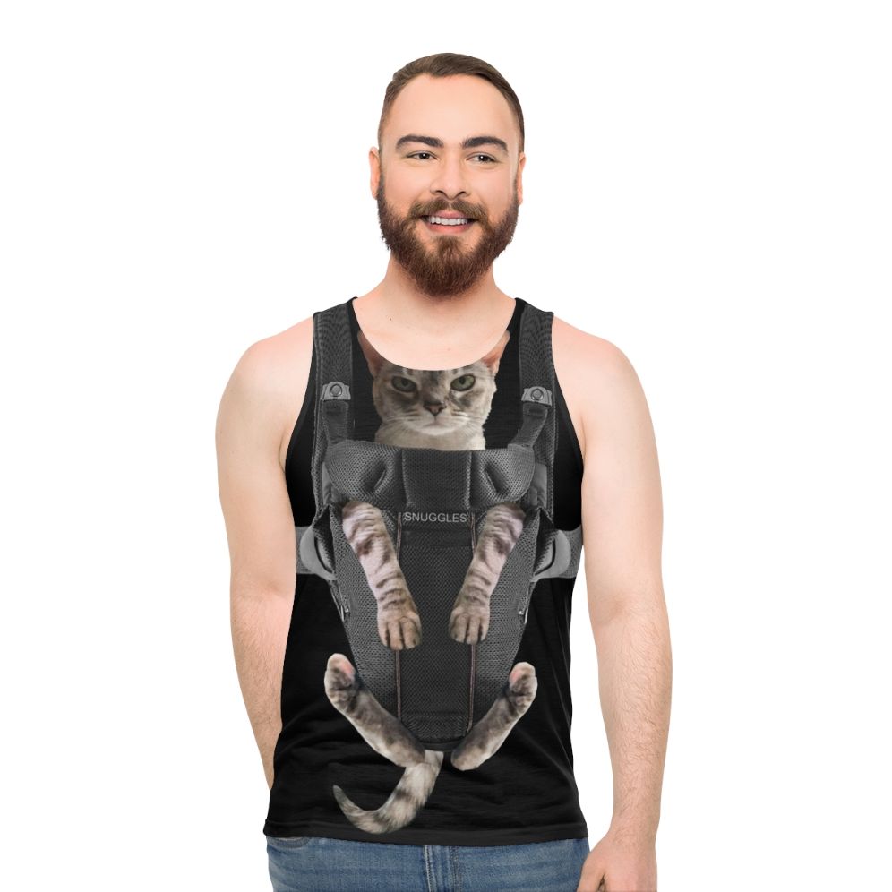 Funny cat in baby carrier - men