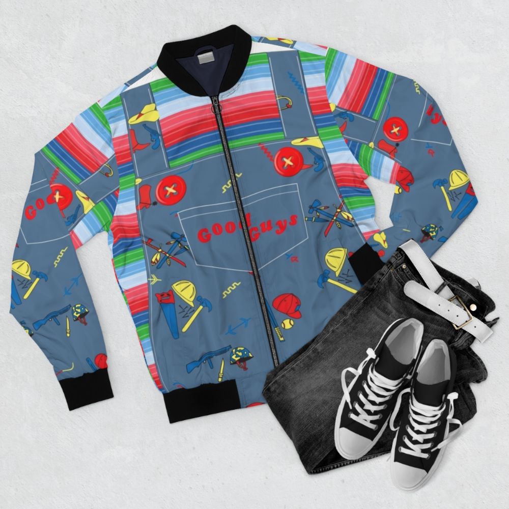 A Child's Play Chucky horror-themed bomber jacket for kids, featuring the iconic killer doll character. - Flat lay