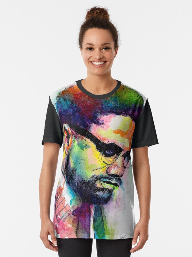 Man wearing a black t-shirt with a graphic design of Malcolm X, a prominent civil rights activist - Women