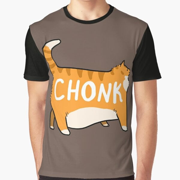 Chonky orange tabby cat graphic printed on a t-shirt