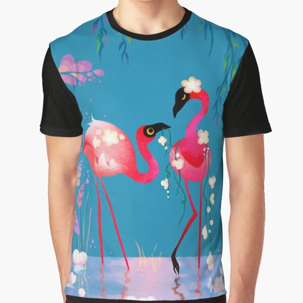 Colorful graphic design of a flamingo bird surrounded by vibrant flowers and foliage on a t-shirt.