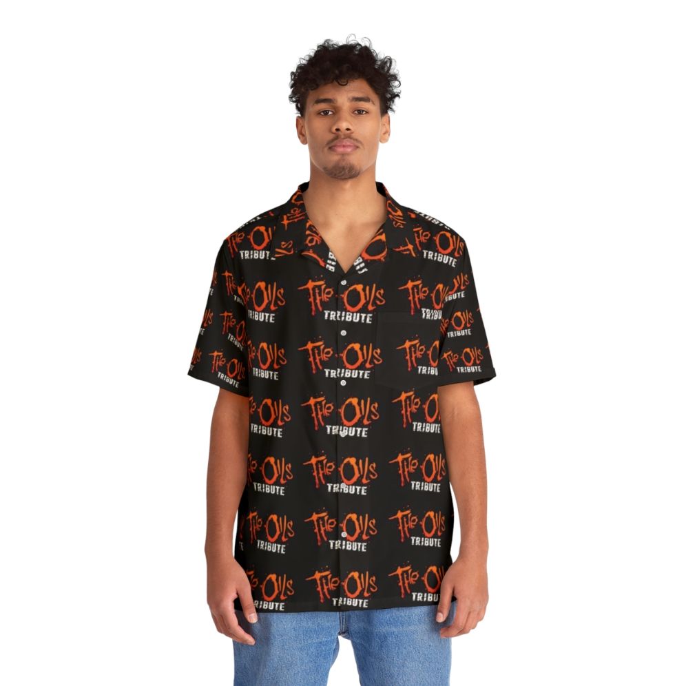 Orange Hawaiian shirt with The Oils Tribute logo - People Front