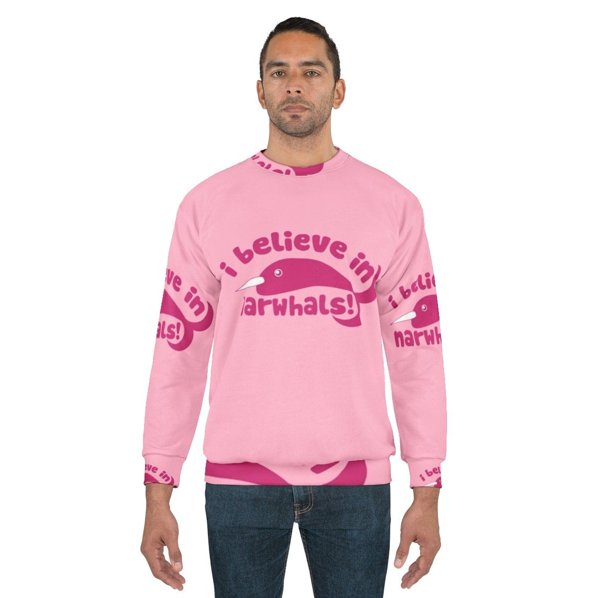 Pink sweatshirt with graphic of a cute narwhal and the text "I Believe in Narwhals" - men