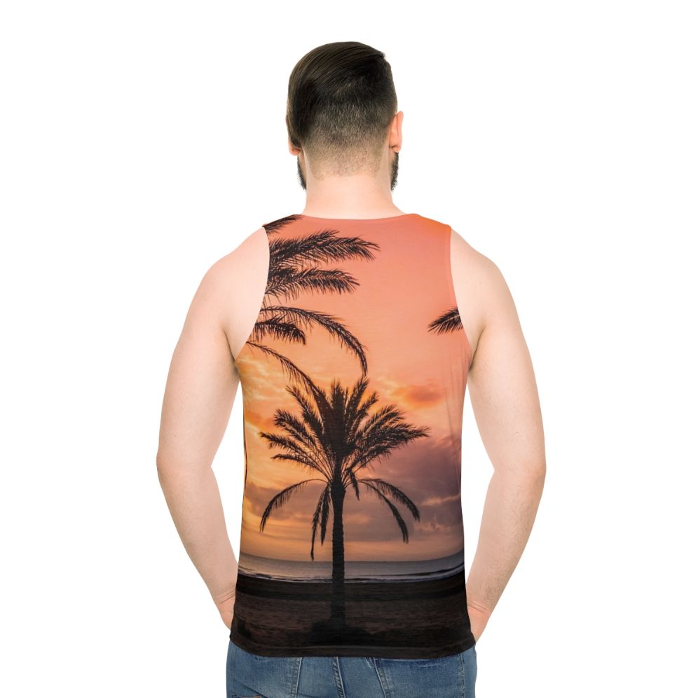 Unisex tank top with a tropical sunrise over palm trees design - men back