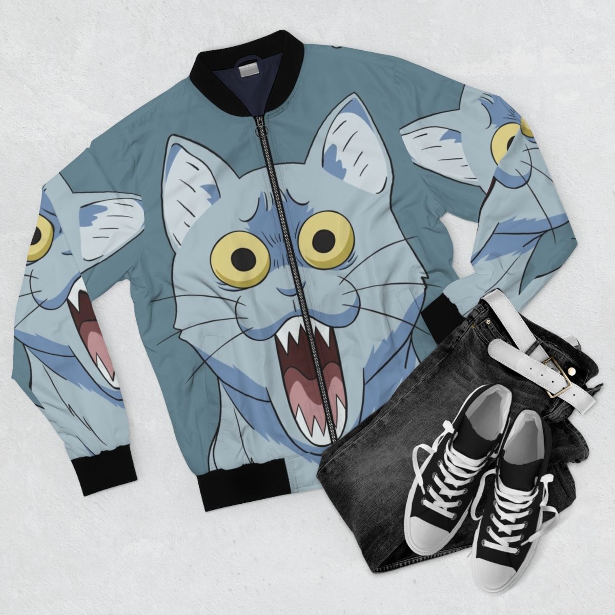 Shocked and horrified anime-style cat graphic printed on a bomber jacket - Flat lay