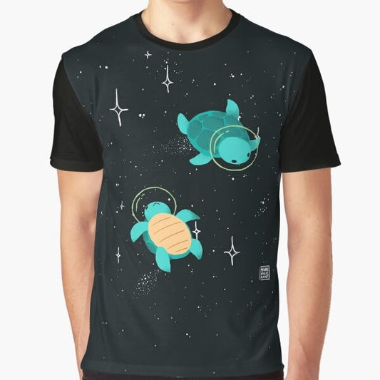 Adorable space turtle graphic design on a green t-shirt with stars and cosmic elements.