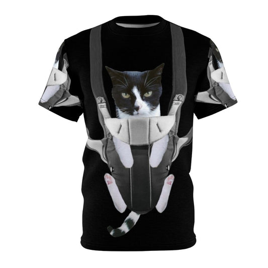 Illustration of a cat snuggled up in a baby carrier on a t-shirt