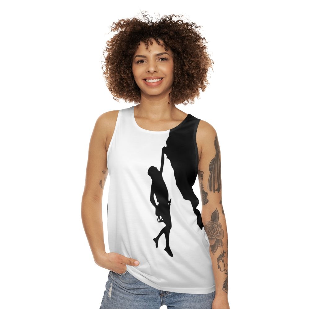 Man climbing rock wall wearing Climb Cliffhanger Unisex Tank Top - women