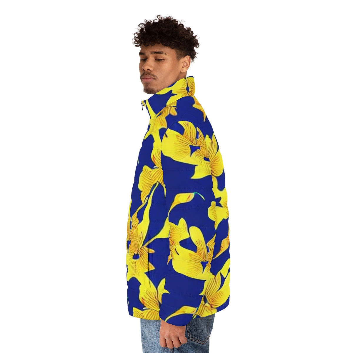 Closeup of a blue puffer jacket featuring a vibrant abstract yellow floral pattern - men side left