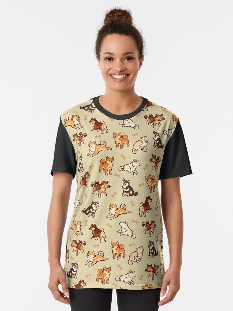 Graphic t-shirt featuring a pattern of cute shiba inu dogs in a cream background - Women